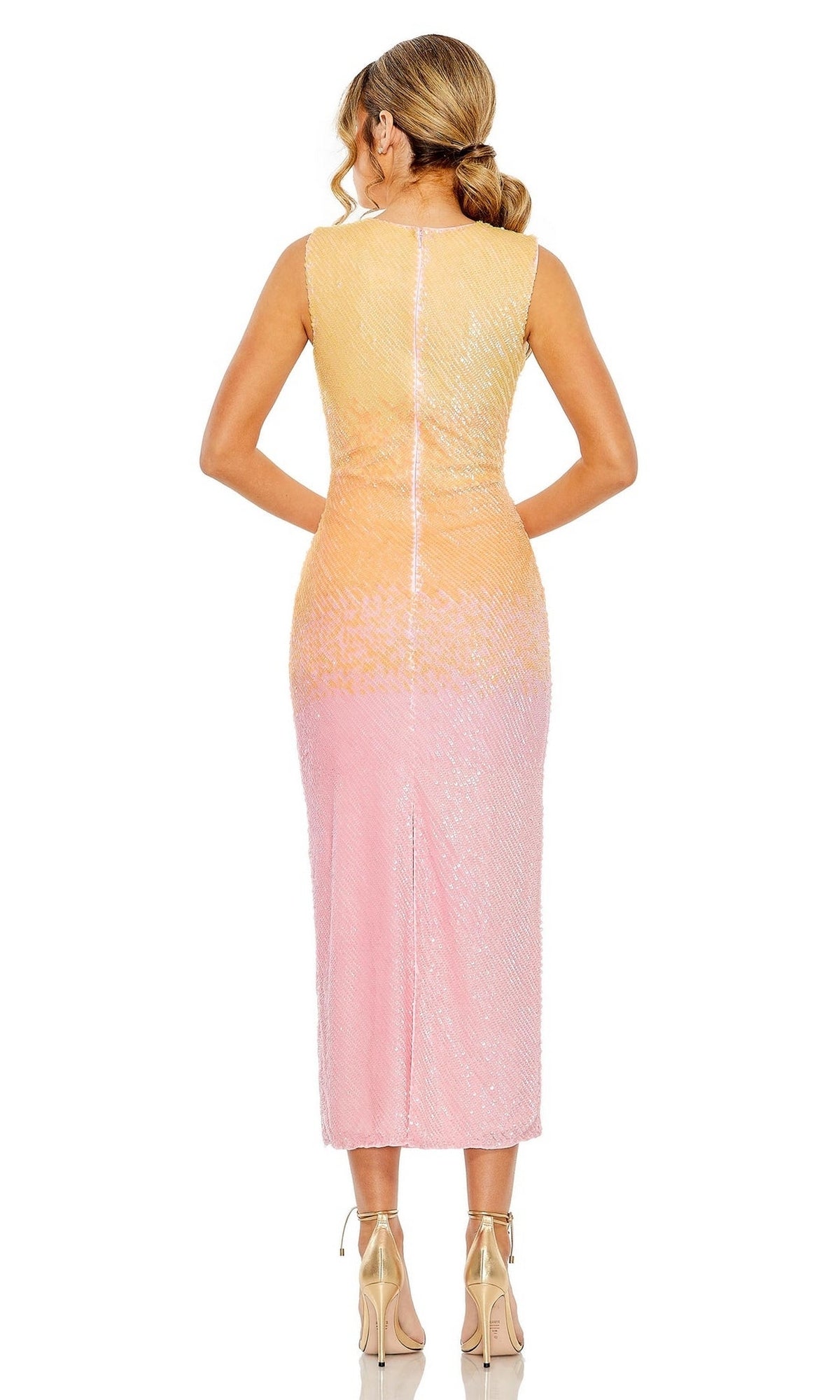 A woman with light brown hair in a ponytail faces away, wearing the Mac Duggal Short Semi-Formal Dress 5772—a sleeveless midi dress with a yellow-to-pink ombre sequin texture—paired with nude heels.
